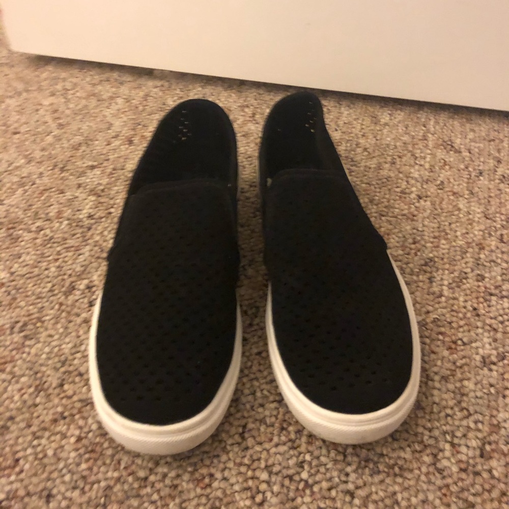 Black loafer with white sole